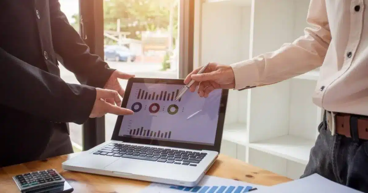 Sales team using ERP software to manage leads and close deals